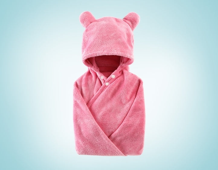 Rose red hooded baby towel on a light blue background